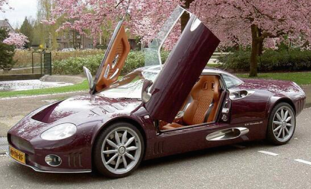 Spyker C8 Long Wheelbase with faux riveted body panels and extended wheel arches.